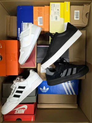 The photo shows a package with footwear in the category CS.