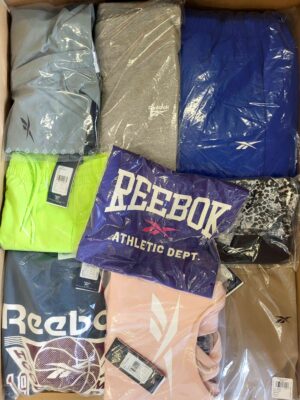 The photo shows a package with clothing in the category R.