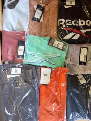 The photo shows a package with clothing in the category R.