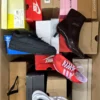The photo shows a package with footwear in the category CS.