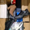 The photo shows a package with footwear in the category CS.