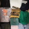 The photo shows a package with clothing in the category TSC.