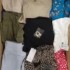 The photo shows a package with clothing in the category TSC.