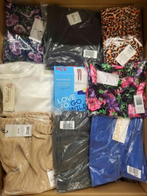 The photo shows a package with clothing in the category AR.