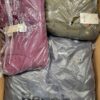 The photo shows a package with clothing in the category AJW.