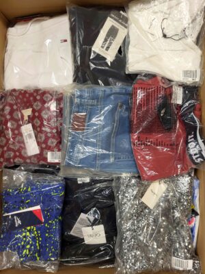 The photo shows a package with clothing in the category AW.
