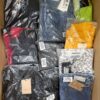 The photo shows a package with clothing in the category AP.