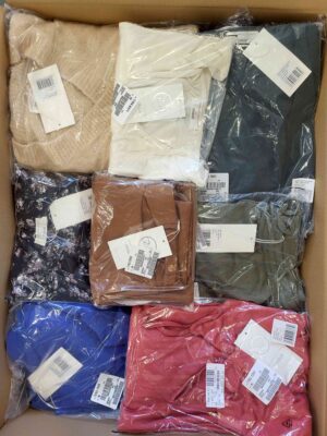 The photo shows a package with clothing in the category YA.