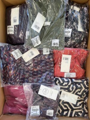 The photo shows a package with clothing in the category YA.