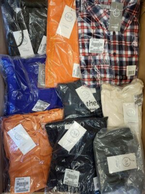 The photo shows a package with clothing in the category YA.