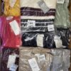 The photo shows a package with clothing in the category YA.