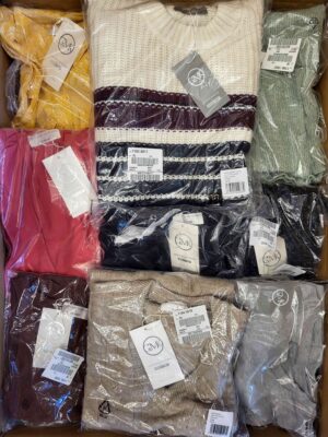 The photo shows a package with clothing in the category YA.