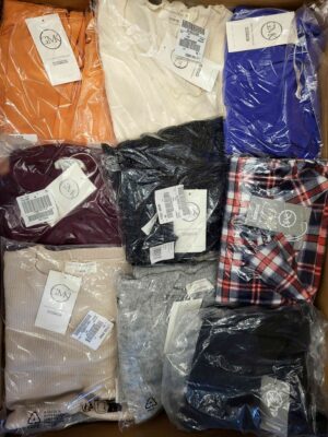 The photo shows a package with clothing in the category YA.