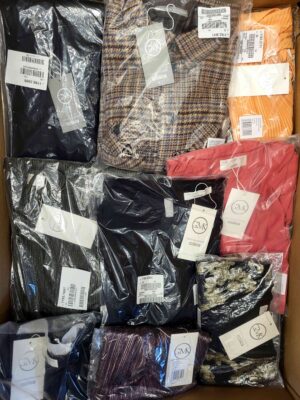 The photo shows a package with clothing in the category YA.