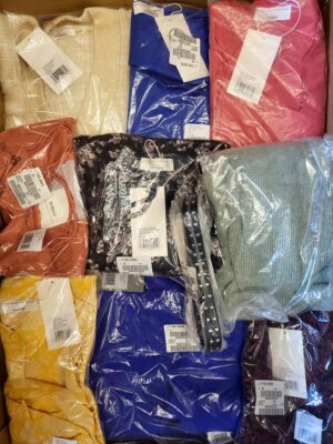 The photo shows a package with clothing in the category YA.