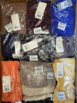 The photo shows a package with clothing in the category YA.