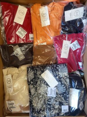 The photo shows a package with clothing in the category YA.