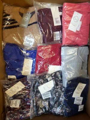 The photo shows a package with clothing in the category YA.