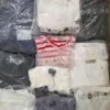 The photo shows a package with clothing in the category D.