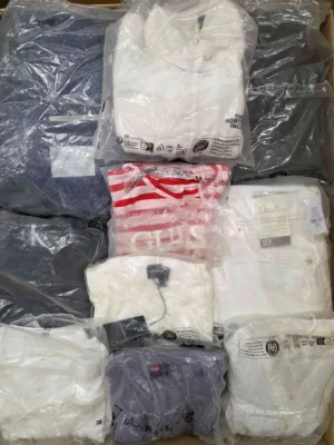 The photo shows a package with clothing in the category D.