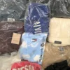 The photo shows a package with clothing in the category D.