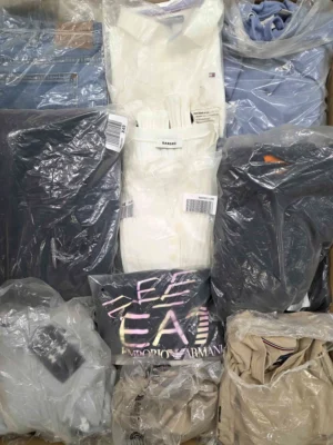 The photo shows a package with clothing in the category D.