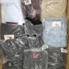The photo shows a package with clothing in the category D.