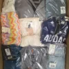The photo shows a package with clothing in the category B.