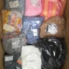 The photo shows a package with clothing in the category B.
