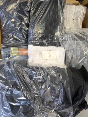 The photo shows a package with clothing in the category C.