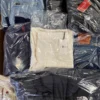 The photo shows a package with clothing in the category C.