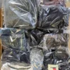 The photo shows a package with clothing in the category C.