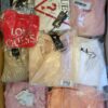 The photo shows a package with clothing in the category B.