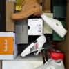 The photo shows a package with footwear in the category BS.