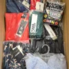 The photo shows a package with clothing in the category AU.