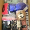 The photo shows a package with clothing in the category AU.