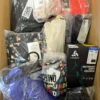 The photo shows a package with clothing in the category AU.