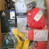 The photo shows a package with clothing in the category AU.