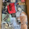 The photo shows a package with clothing in the category AU.