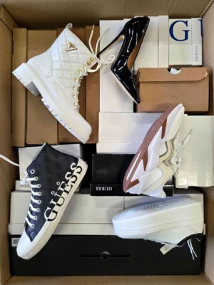 The photo shows a package with footwear in the category BS.