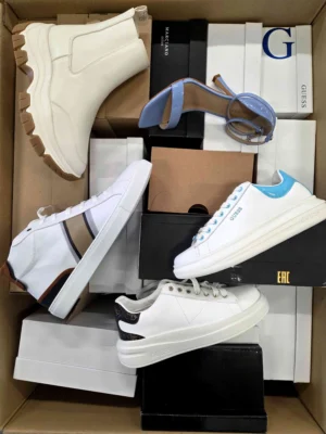 The photo shows a package with footwear in the category BS.