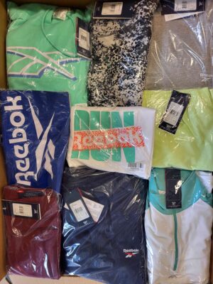 The photo shows a package with clothing in the category R.