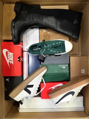 The photo shows a package with footwear in the category CS.