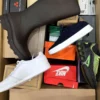 The photo shows a package with footwear in the category CS.