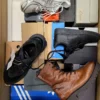 The photo shows a package with footwear in the category CS.