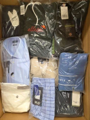 The photo shows a package with clothing in the category AM.
