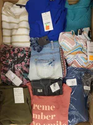 The photo shows a package with clothing in the category TSC.