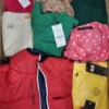 The photo shows a package with clothing in the category TSC.
