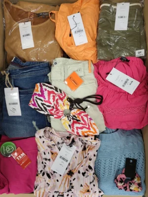 The photo shows a package with clothing in the category TSC.