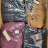 The photo shows a package with clothing in the category AJW.